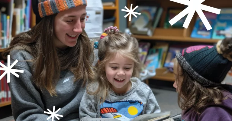 a parent and chiild reading together in the Library