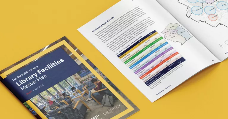A print copy of the London Public Library's Library Facilities Master Plan draft sits on a yellow background. with pages open to show a chart and map.
