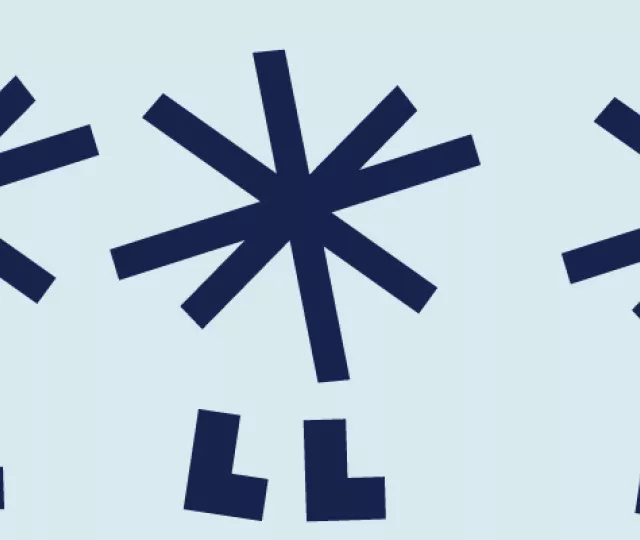 a group of animated characters that look like snowflakes in navy blue moving across a light blue background
