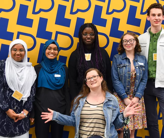 A smiling group of volunteer at Central Library