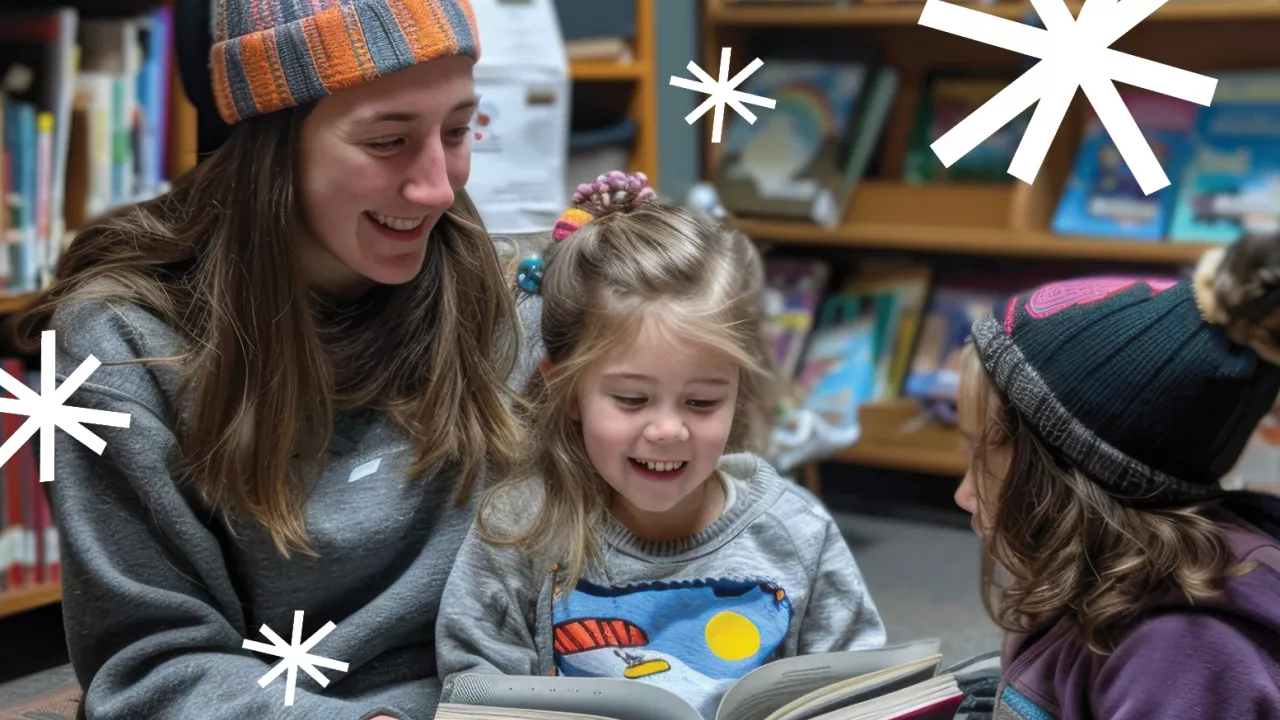 a parent and chiild reading together in the Library