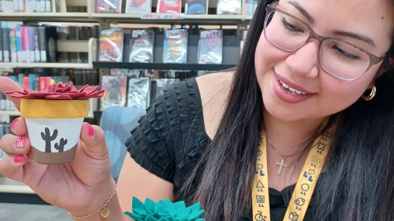 A person holding a craft at Byron Library