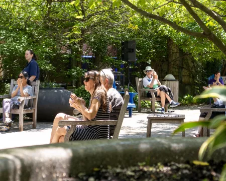 People sitting in our reading garden