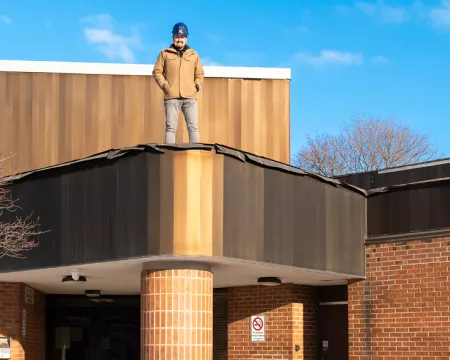 LPL staff standing on top of Beacock Branch Library's roof.