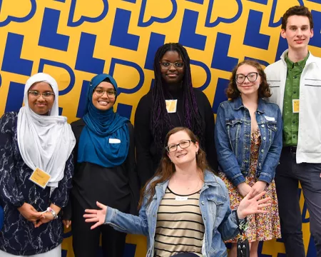 A smiling group of volunteer at Central Library