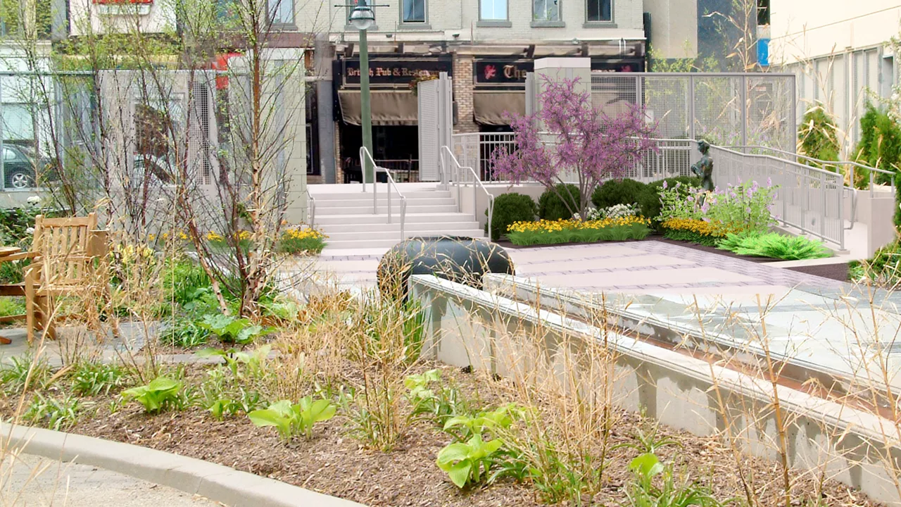 Installation of the gate and accessible ramp at Dundas Place