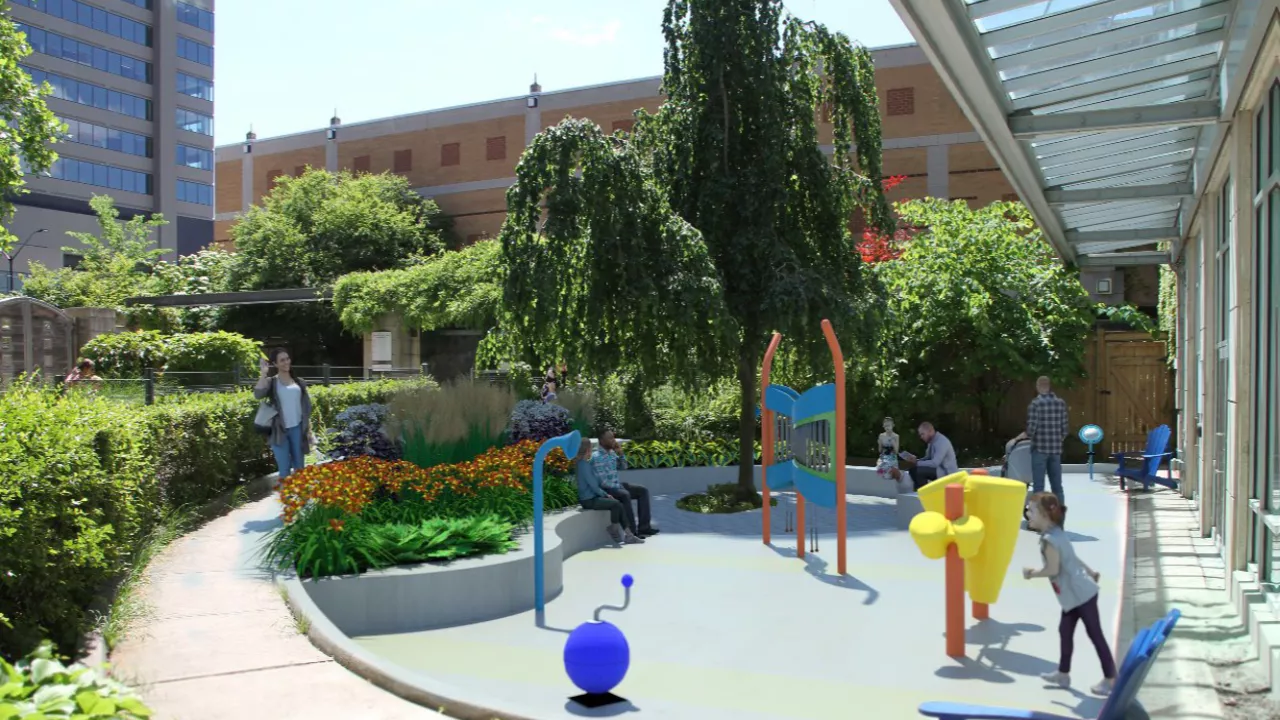 Install outdoor musical instruments in the Children’s Play Area and install ground surface material.