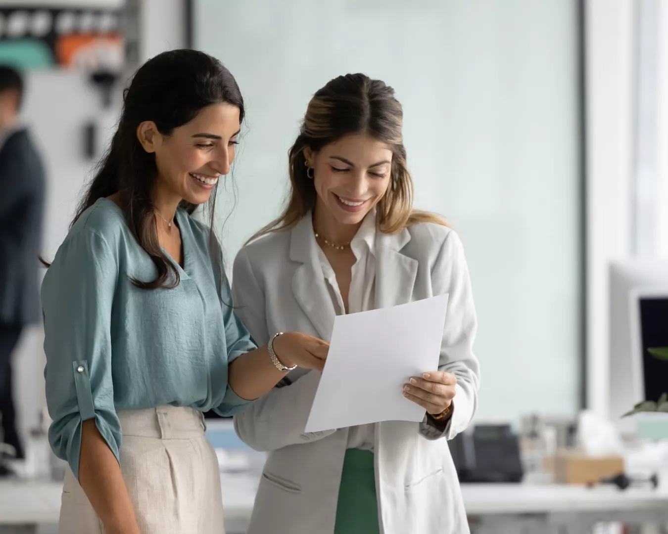 Two people completing a survey at the Library