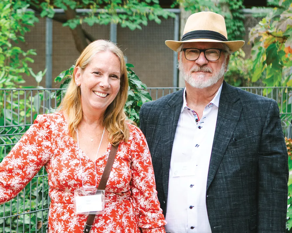 Adults standing in the Rotary Reading Garden